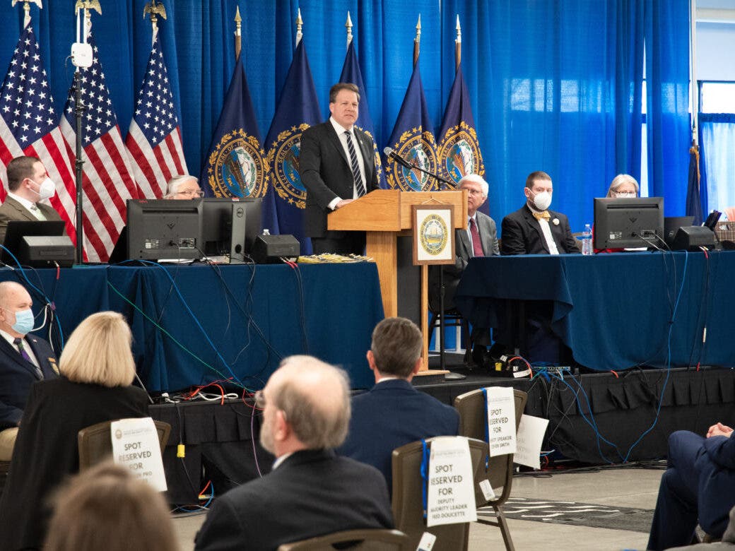 Gov. Chris Sununu is pictured giving his State of the State address Thursday at the DoubleTree Inn in Manchester.
