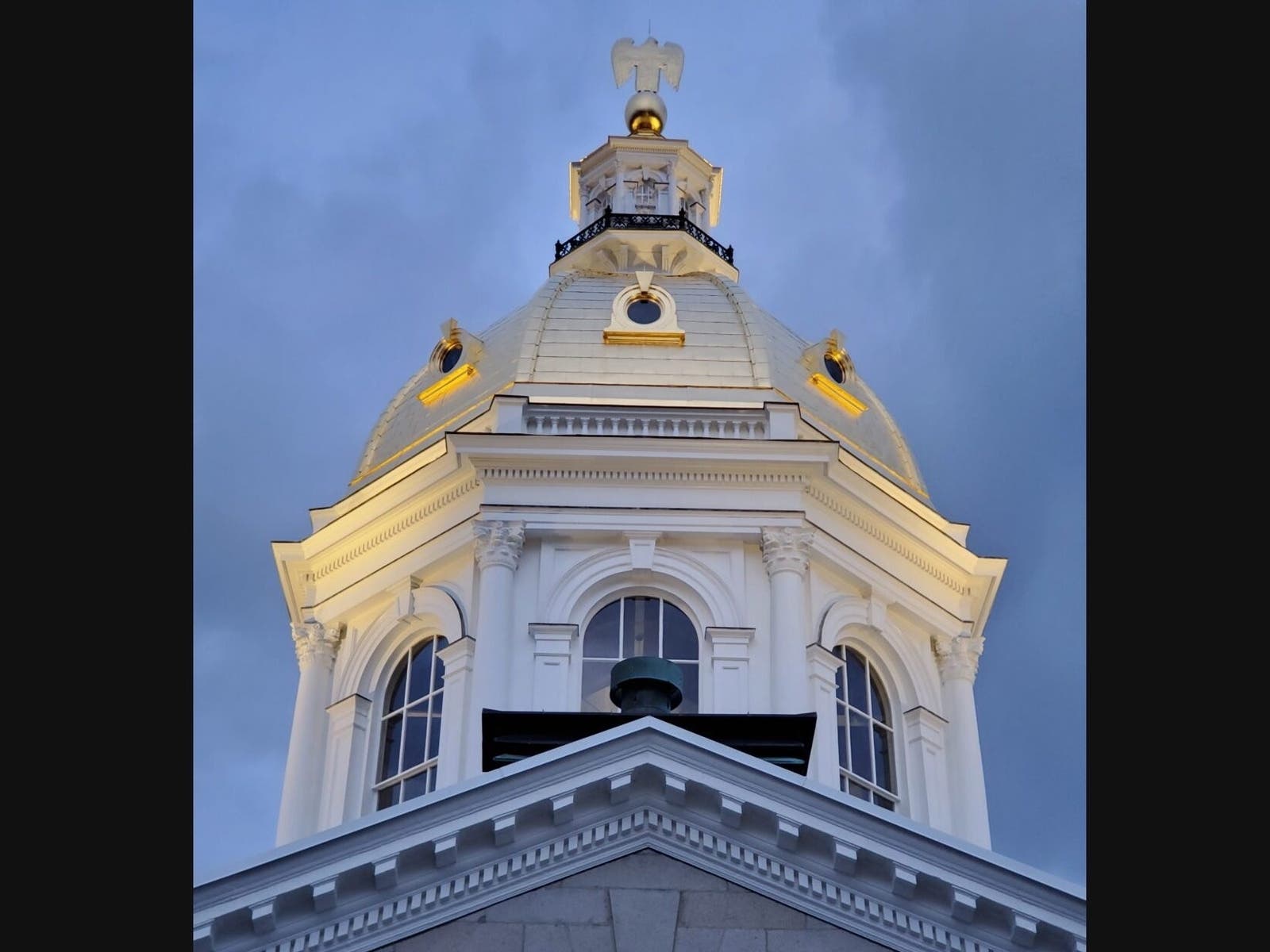 Night view back of the State House