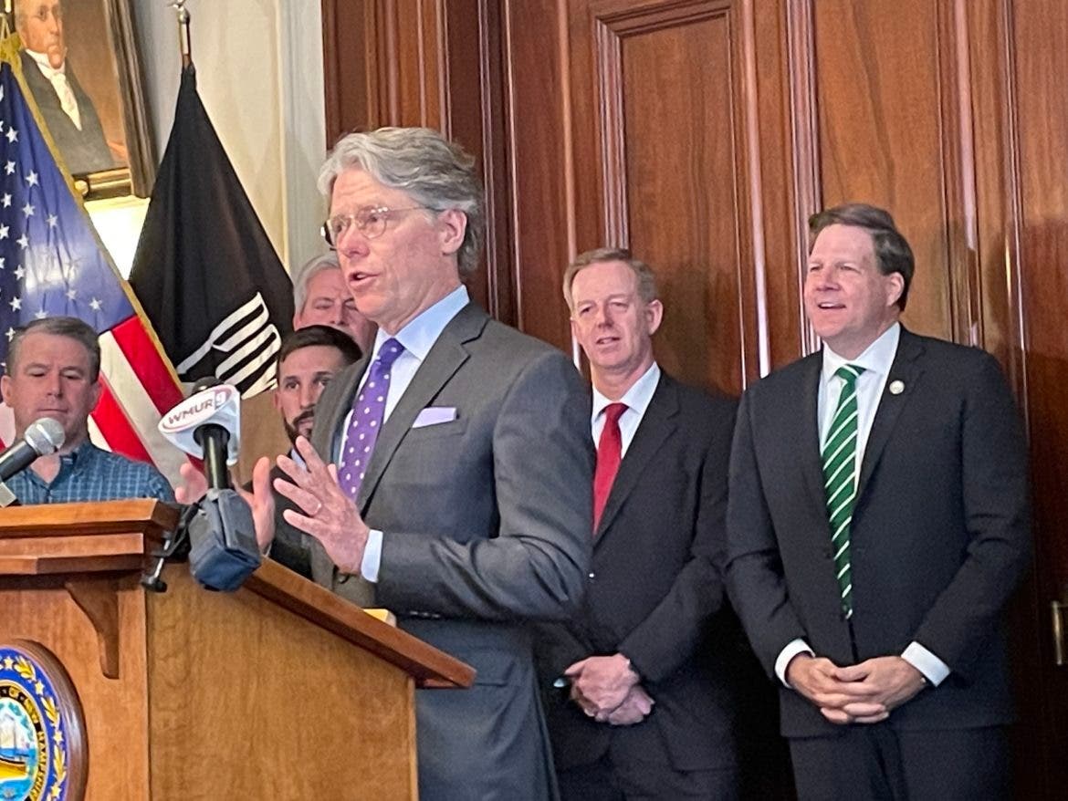 Commissioner Taylor Caswell speaks in support of Governor Sununu's $100 million InvestNH Housing Incentive Fund proposal at a press conference.