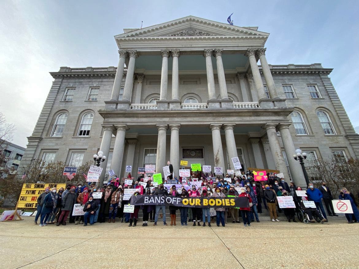 Abortion rights advocates gathered at the New Hampshire State House recently.