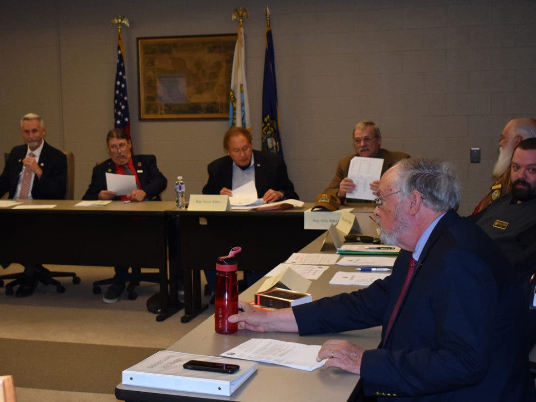 Chair Michael Sylvia, left, and Norm Silber, third from left, were grilled about legal expenses that exceeded $30,000. From left are Reps. Sylvia, Ray Howard, Silber, Glen Aldrich, Harry Bean, Richard Littlefield, Thomas Ploszaj, and Paul Terry.