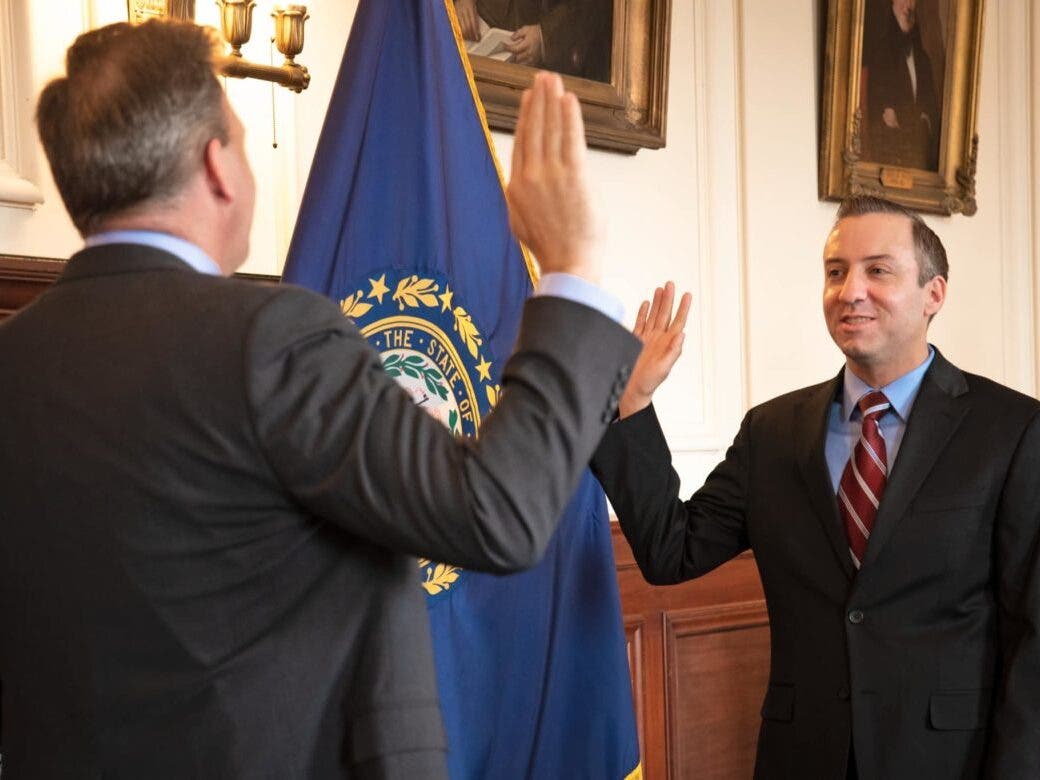 Gov. Chris Sununu swears in his former legal counsel John Formella as Attorney General in April 2021.
