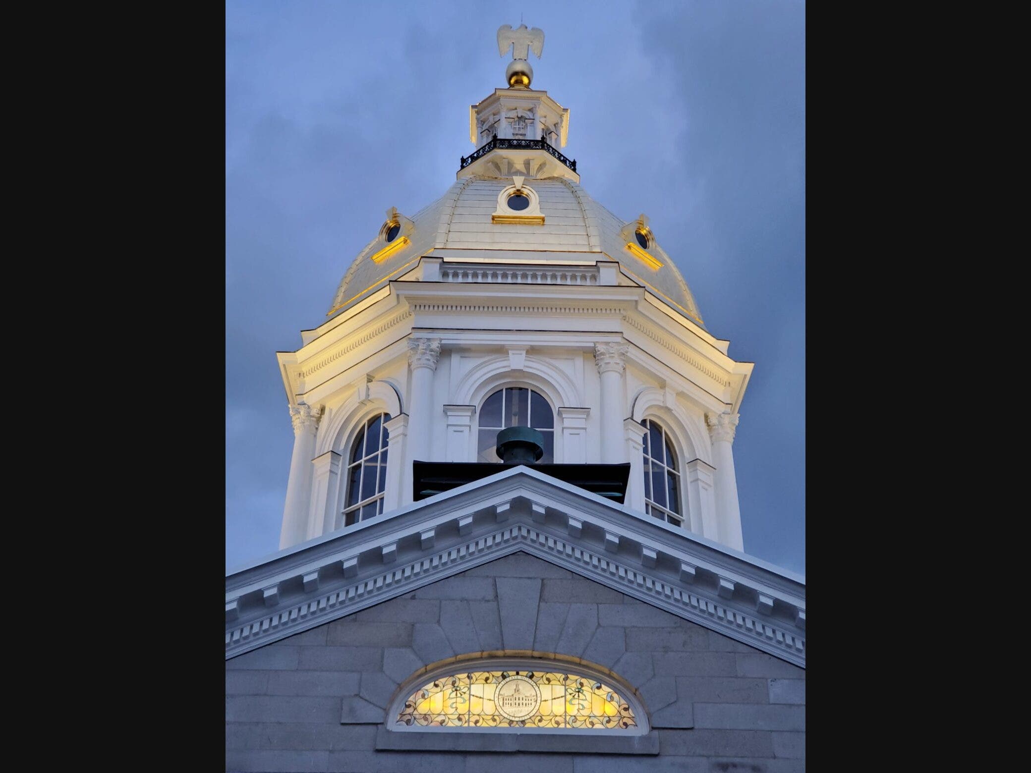 Night view back of the State House