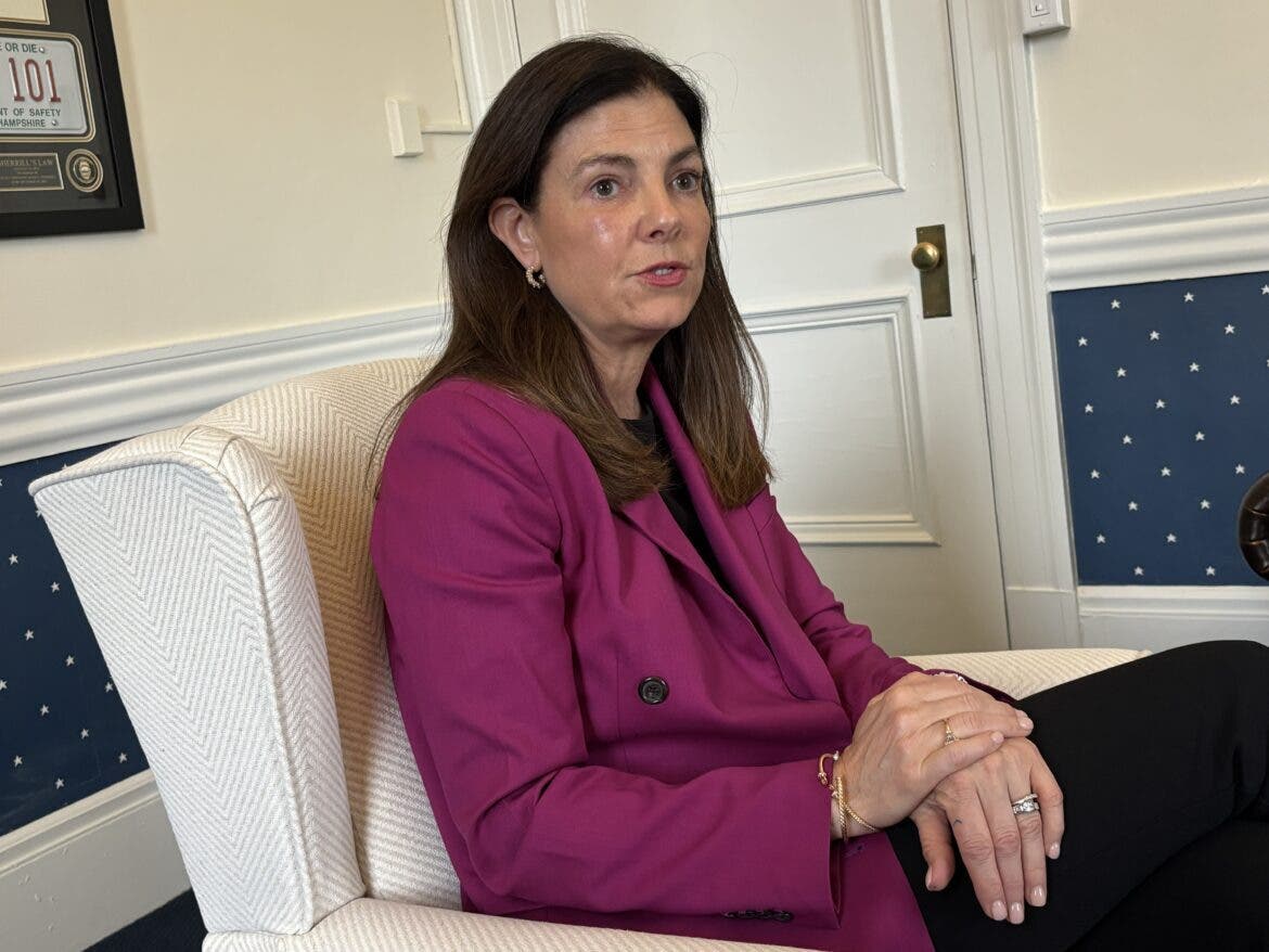 Gov. Kelly Ayotte is pictured Wednesday speaking with reporters.