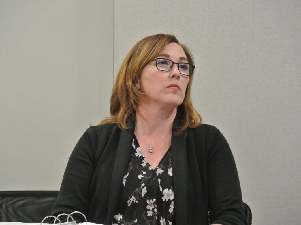 Warden Michelle Edmark is pictured testifying at a Personnel Appeals Board hearing involving Claudia Cass in this file photo.