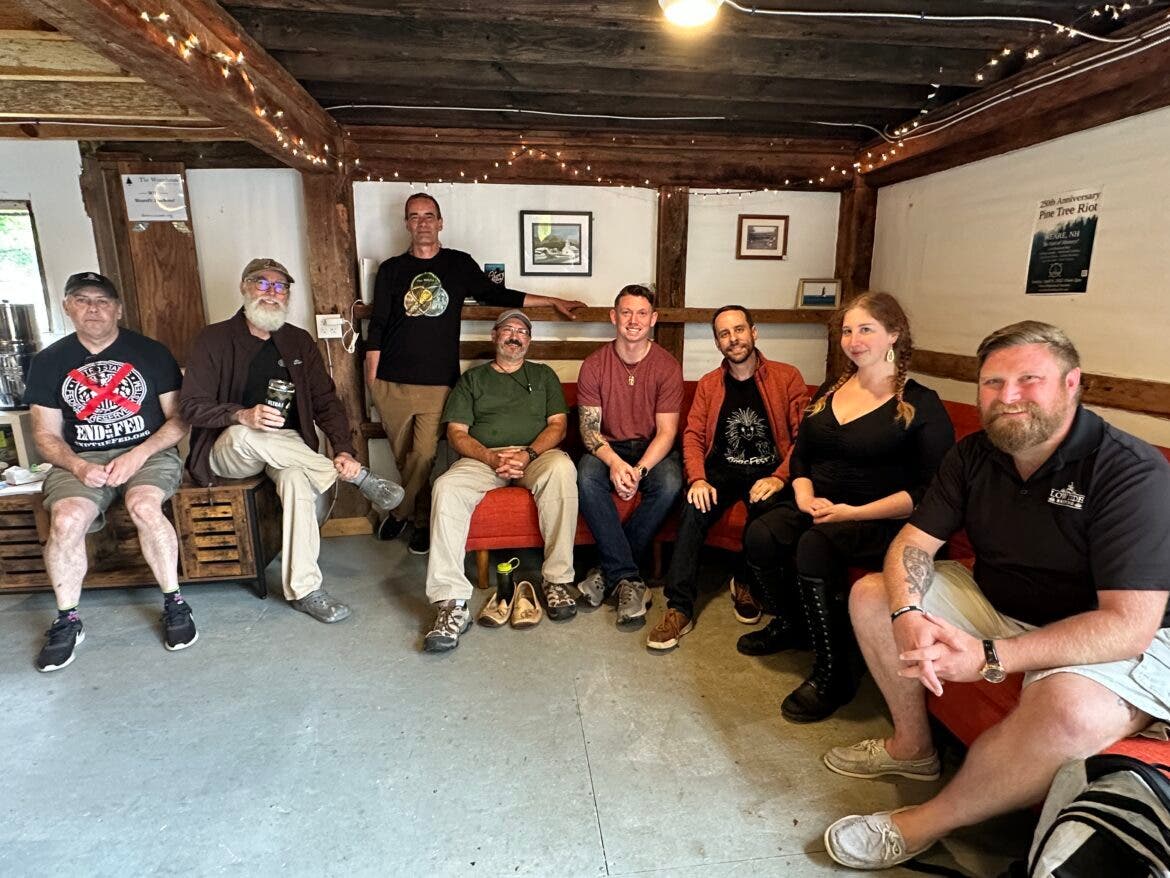 The Free State Stoics met at the Wearehouse on Tuesday. Eric Brakey, executive director of the Free State Project is third from right.