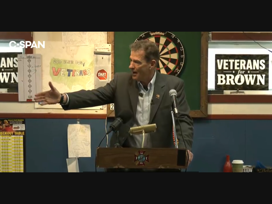 Republican U.S. Senate candidate Scott Brown speaks with veterans in Concord Wednesday.