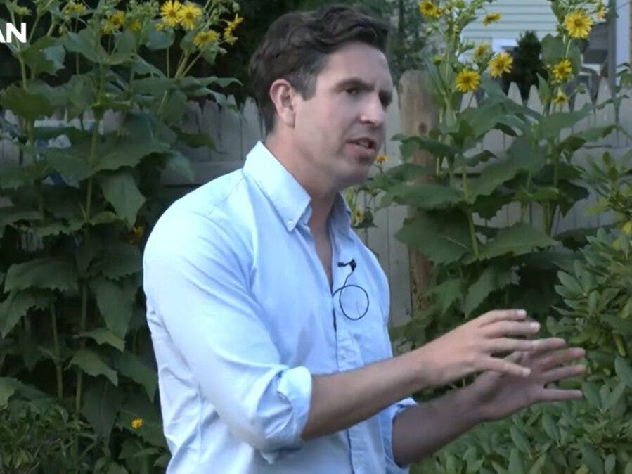 Christian Urrutia speaks Wednesday evening at Portsmouth house party.