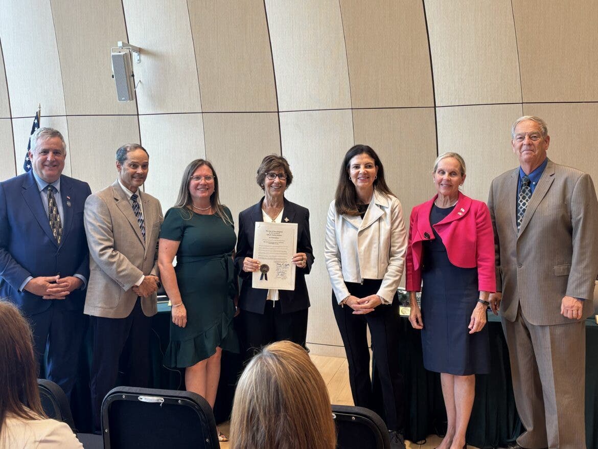 Retired Superior Court Judge Jean Burling is pictured with Gov. Kelly Ayotte and members of the Executive Council Wednesday. Burling was honored by the Governor and Executive Council at the Hopkins Center at Dartmouth College.