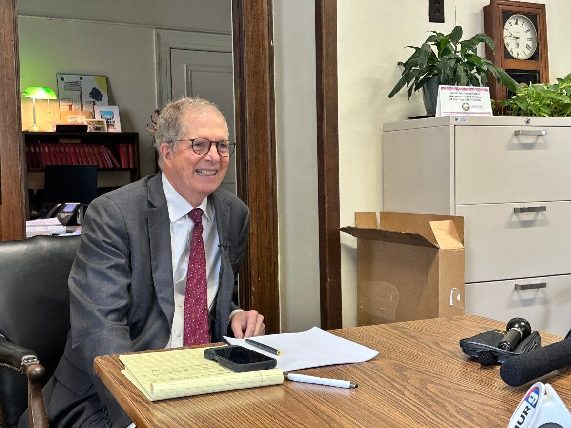 Secretary of State David Scanlan met with reporters recently at his office in the State House in Concord in this file photo.