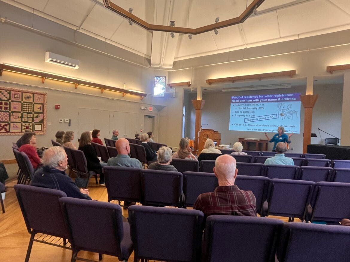 Cynthia Walter, volunteer with League of Women Voters New Hampshire, speaks at the 5th Annual Environmentalist Summit on Saturday in Plymouth.