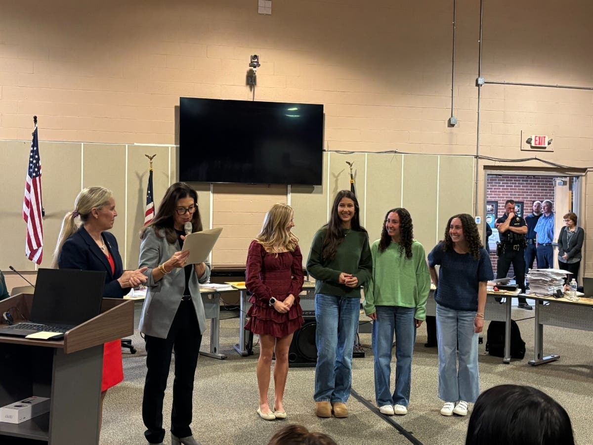 Madie Poteet, Izzie Bremer, Alexis Paterna, Brianna Paterna at Wednesday's Executive Council meeting. National champions, the Exeter High School girls track and field team received a commendation from the governor.