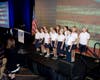 (From left to right) Members of the Beth Yesurun Day School Choir leading the audience in the National Anthem and Hatikvah, at the FIDF South Texas Gala. 