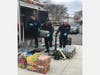 Medford Fire Department helped deliver a donation of food from BJ's in Medford to the Mystic Community Market.