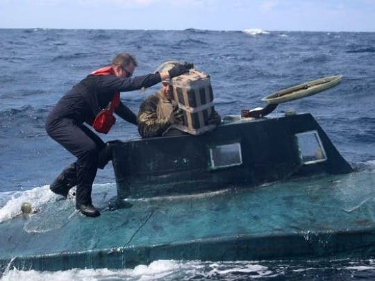 Off-loading cocaine from the submarine.