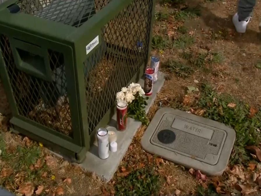 Flowers placed at the site of a vigil held Monday in Vallejo for Eric "Cheddaman" Reasons.