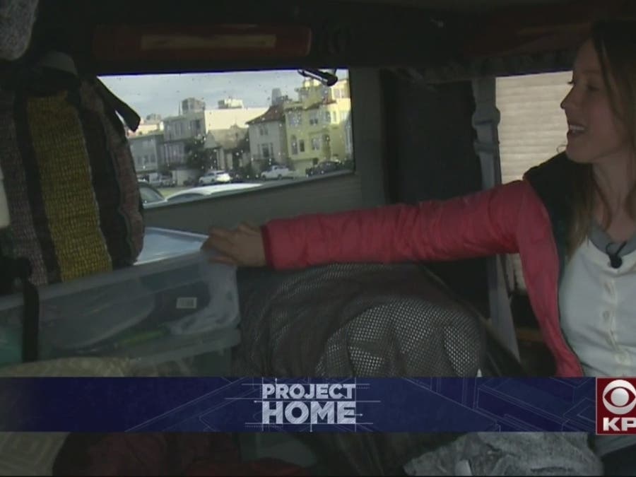Kristin shows off her van living space.