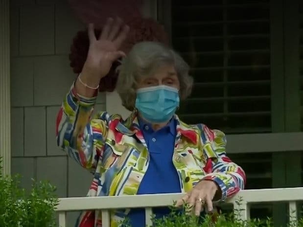  Mothers and grandmothers greeted their families from first-floor balconies in pre-arranged, half-hour visits.