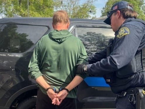 Corey Foster, 51, is seen in handcuffs after being arrested in Rohnert Park on March 29, 2026