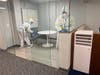 Hospital-grade cleaning service underway in a small meeting room at Office Suites of Darien on May 7.