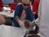 RJWC member Linda Dill prepares a fresh cooked Maine Lobster for pick-up.