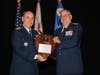 Col Lee Safley, r, receives the Disaster Relief Award on behalf of the South Carolina Wing of Civil Air Patrol, awarded by Maj Gen Mark Smith, Civil Air Patrol National Commander.