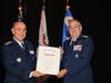 South Carolina Wing Commander Col Lee Safley, CAP, at right, receives a Meritorious Service Award from Maj General Mark Smith, Civil Air Patrol's National Commander.