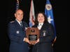 1Lt Rachael J. Mercer, Public Affairs Officer for South Carolina Wing of Civil Air Patrol, receives the Col Robert Payton Public Affairs Officer of the Year Award from Maj Gen Mark Smith, l, in Baltimore, M.D. recently.