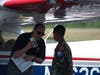 A Spartanburg Composite Squadron pilot explains the role of aviation fuel and its coloring to a cadet from the Aiken Composite Squadron.