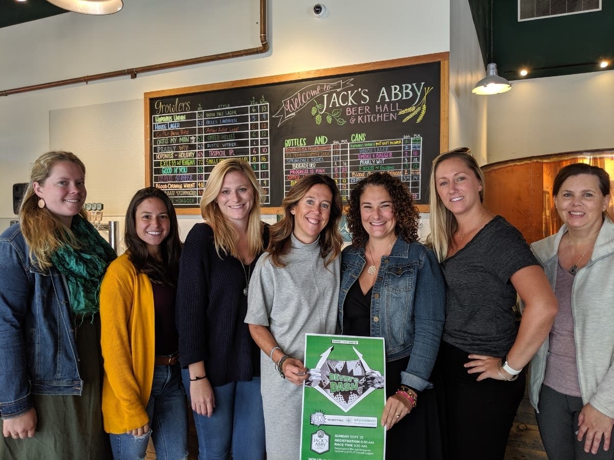 Jack's Abby employees Brittany Hernandez, Kat Leggett, Gia Jobin, work with Christine Suau, Mo Bentley, Heather Claflin and Jenny Landsiedel to plan Devin's Dash.