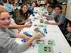 Students make decorative skulls at The Chocolate Duck
