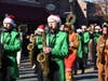 Farmingdale High School’s marching band performs in the annual village holiday parade.