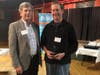 Merrimack Valley Habitat Board President Richard Sumberg (pictured left) presents the Margot Bixby Leadership Award to Stuart Johnson, MVHFH Board Member and Volunteer.