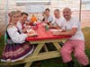 Attendees in Traditional Polish Costumes Enjoy Authentic Polish Cuisine at the Polish American Family Festival and Country Fair at the National Shrine of Our Lady of Czestochowa
