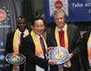 Dr. Hong, Tao-Tze, president of FOWPAL, center, presents the compass clock of conscience, celebrating the United Nations' designation of April 5 as the International Day of Conscience to Rhode Island Lieutenant Governor Daniel Mckee at the UN in New York.