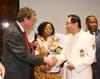 Dr. Hong, Tao-Tze, president of FOWPAL, right, is honored by Rhode Island Lieutenant Governor Daniel Mckee for fostering a culture of conscience, love, and peace at a gala dinner in New York, Feb. 19, 2020.