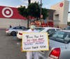 Tai Ji Men dizi, Ray Chen holds a sign that reads, “Taiwan Must End 24-Year Abuses of Tai Ji Men Members’ Human Rights Now,” in front of a Target store in California on August 15, 2020.