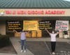 Tai Ji Men dizi hold posters to condemn the Taiwanese government’s human rights abuses against Tai Ji Men in front of the Tai Ji Men Qigong Academy in Cupertino, California on August 15, 2020.