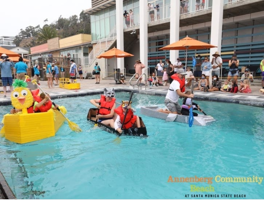 Competitors made their way across the pool in their boats or dragging their boats behind in Saturday's cardboard yacht regatta in Santa Monica.