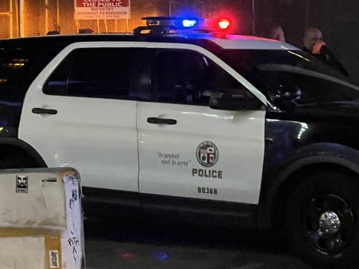 CBS LA reported that a woman fled from the home when the suspect entered.