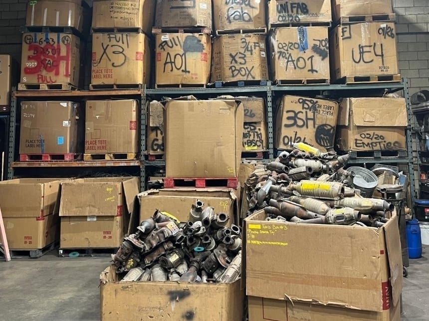 Boxes of catalytic converters were collected during the investigation.