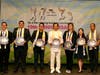 Each of the distinguished guests holds a special clock in celebration of the United Nations’ designation of April 5 as the International Day of Conscience. The face of the clock bears a compass of conscience, symbolizing that all are encouraged to follow 