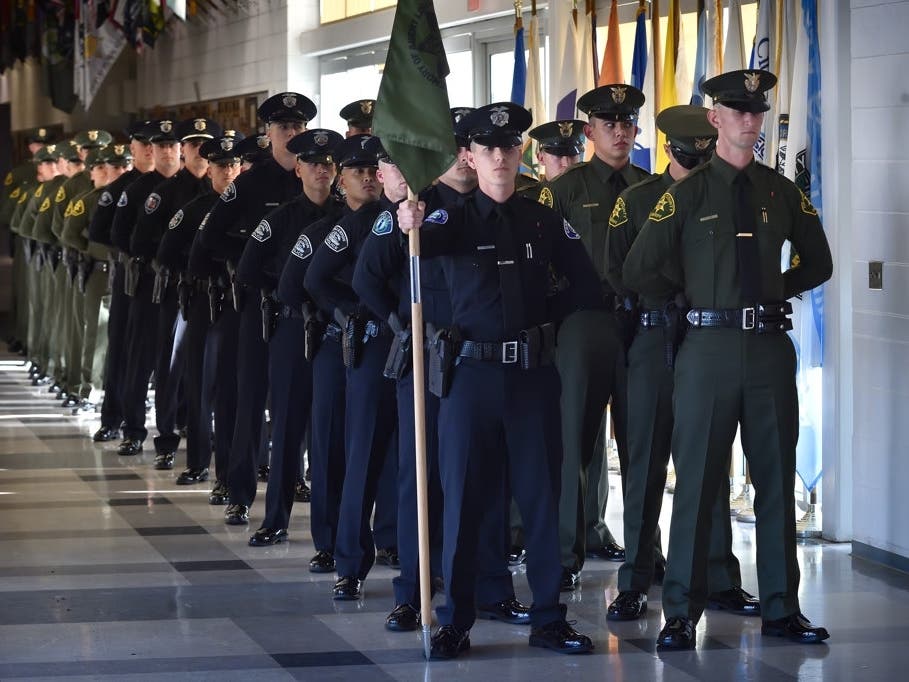 Recruits line up at the start of Orange County Sheriff’s Regional Training Academy’s Class of 239 Graduation Ceremony in this photo from March 2020.