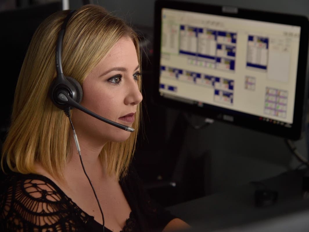 Chelsea Jensen, dispatcher for Tustin Police Department, in a file photo from 2020. 