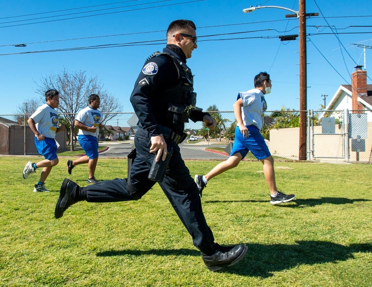 Westminster Police Officer Jason Stouffer visited Sarah McGarvin Intermediate and joined an eighth grade physical education test. 