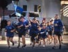 Kids from the Santa Ana Winds Running Club round the corner as they near the end of Santa Ana Police Department’s annual 31 for 31 Run/Walk. 