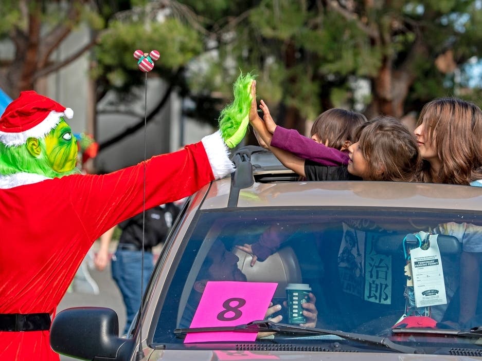 Tustin Police Department holds its annual Santa Cop event with a drive through holiday experience. The event was held at the Tustin Civic Center parking lot on Dec. 10, 2022. 