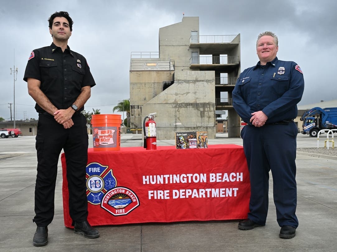 Huntington Beach Fire Department Chief Medical Officer Rom Rahimian, left, and Capt. Steve Teasdale hold a press conference at their training center to talk about the dangers of using illegal fireworks. 