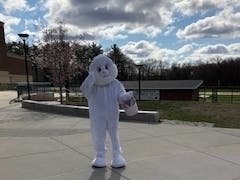 A bunny greeted kids picking up their school meals at Wilmington High School, Friday.
