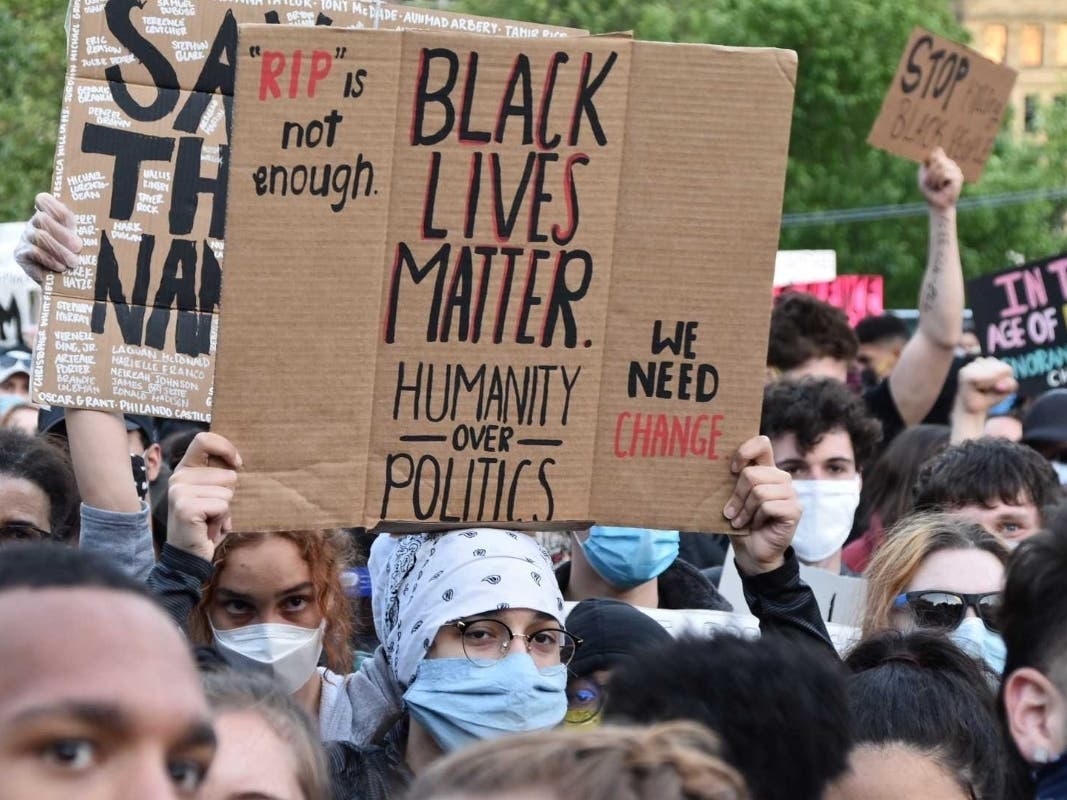 Demonstrators at a rally in Boston on Sunday night protesting police brutality.